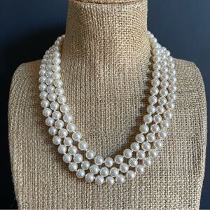 B.C Lind Classic Triple-Strand Pearl Necklace .